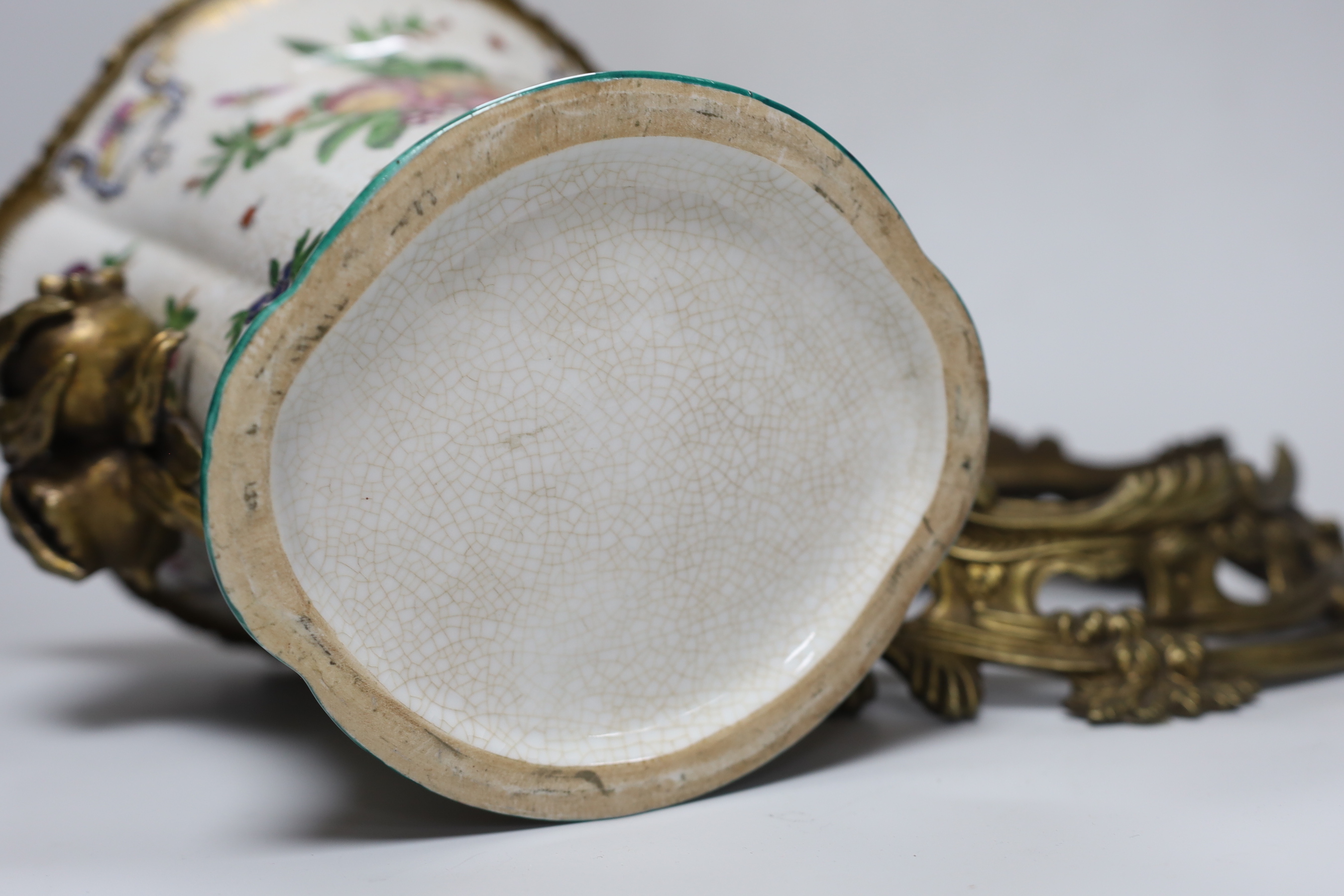 A brass mounted porcelain vase, 27cm